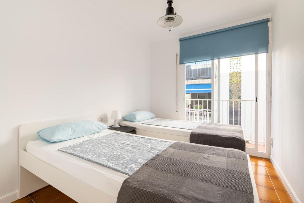 Postel nebo postele na pokoji v ubytování Casita del Bot