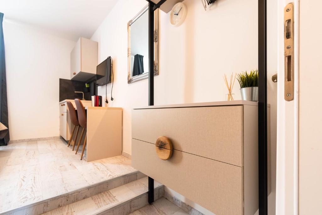 TV a/nebo společenská místnost v ubytování L&B City Center Studios Apartments