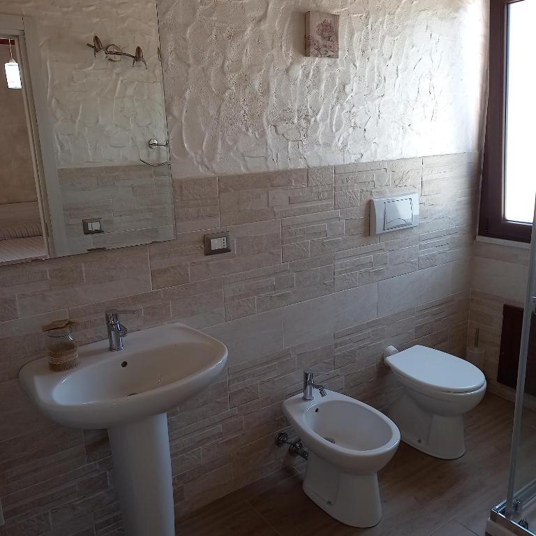 Koupelna v ubytování B&B GLI ULIVI