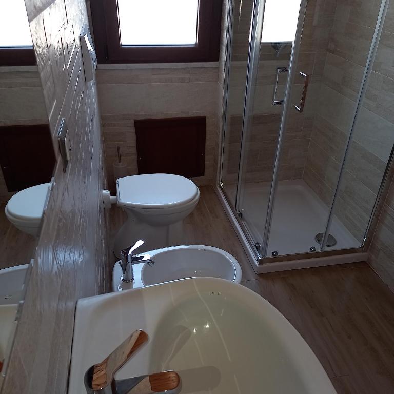 Koupelna v ubytování B&B GLI ULIVI