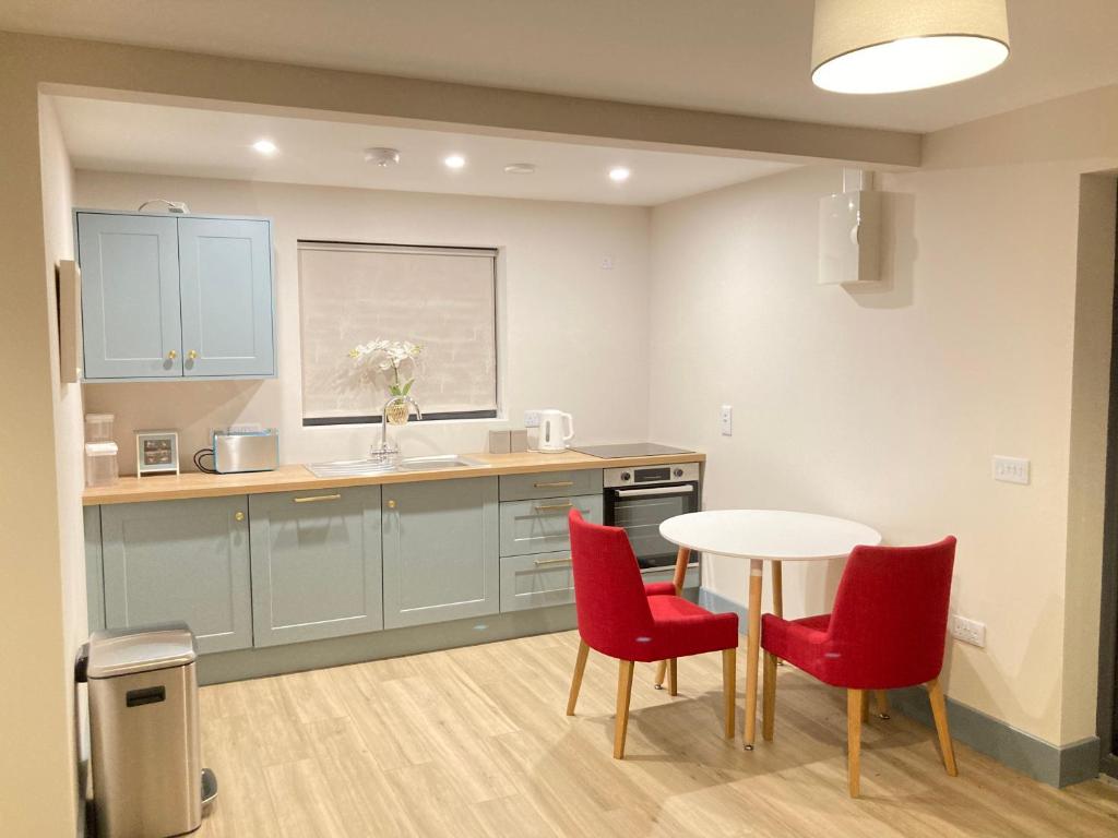 A kitchen or kitchenette at Natures Rest Apartment