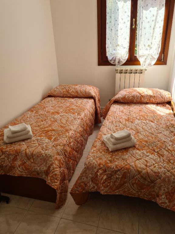 Posteľ alebo postele v izbe v ubytovaní Rosa&Ade