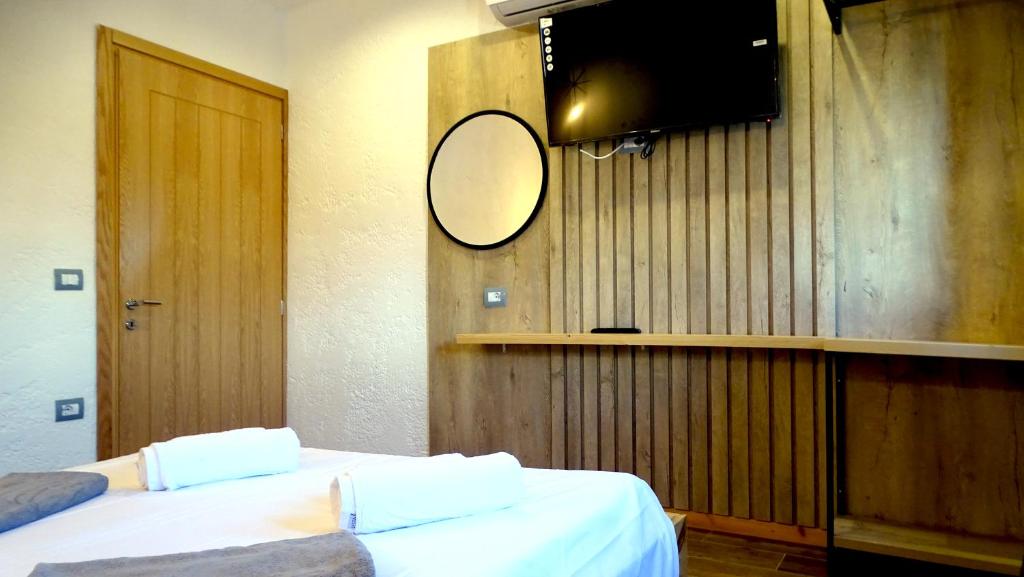 Postel nebo postele na pokoji v ubytování Limni Resort