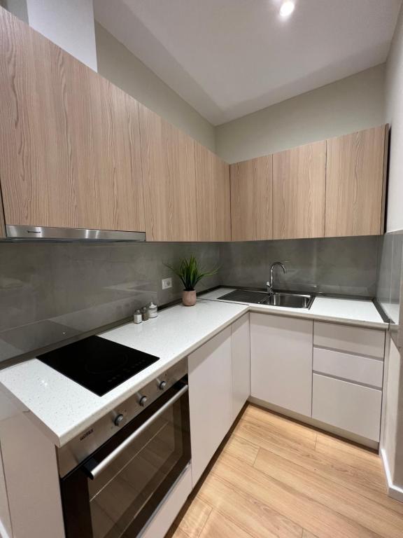 Kuchyň nebo kuchyňský kout v ubytování Costa Adriatica Apartments