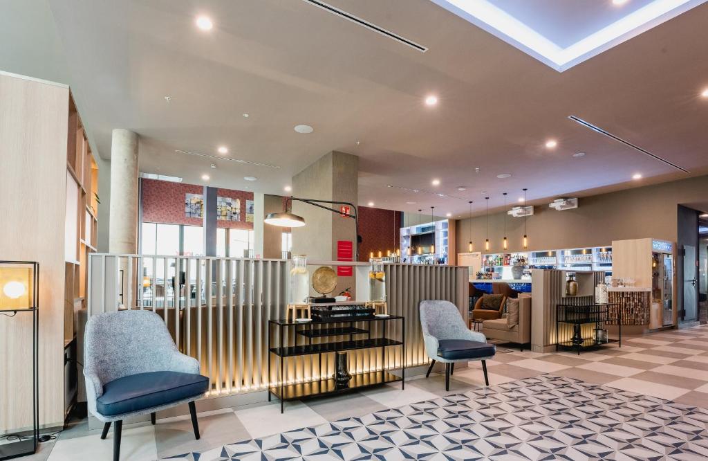Posezení v ubytování Leonardo Royal Hotel Barcelona Fira