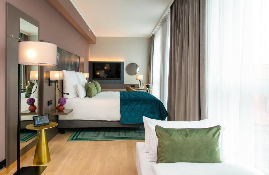 Posezení v ubytování Leonardo Royal Hotel Nürnberg