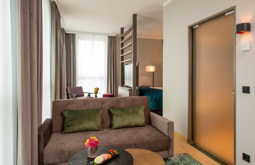 Posezení v ubytování Leonardo Royal Hotel Nürnberg