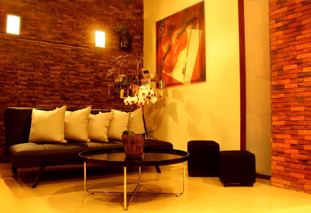 Posezení v ubytování 6 Suites Hotel