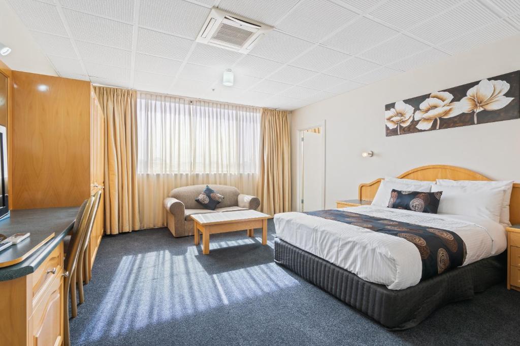 Postel nebo postele na pokoji v ubytování Adelaide International Motel
