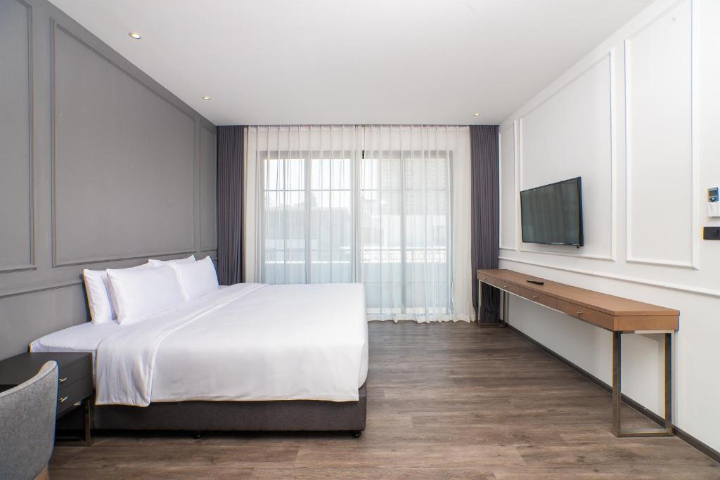 One Patio Hotel Pattaya - SHA Extra Plus - Deluxe Double Room