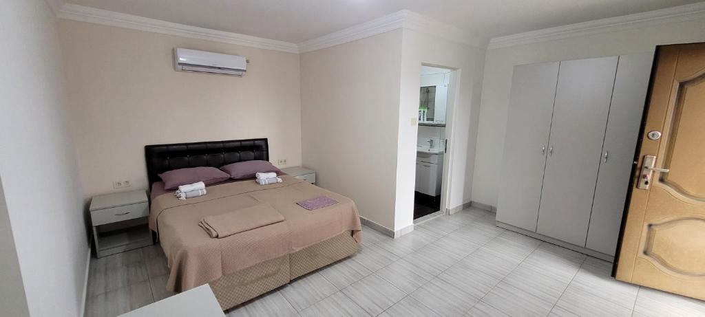 Postel nebo postele na pokoji v ubytování Apsa Butik Hotel