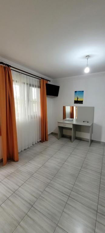 TV a/nebo společenská místnost v ubytování Apsa Butik Hotel