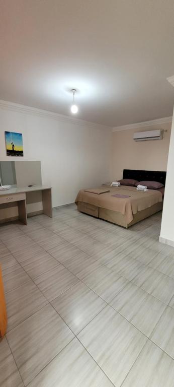 Postel nebo postele na pokoji v ubytování Apsa Butik Hotel