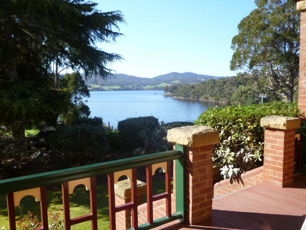 a balcony with a view of a lake at Donalea Bed and Breakfast & Riverview Apartment in Castle Forbes Bay