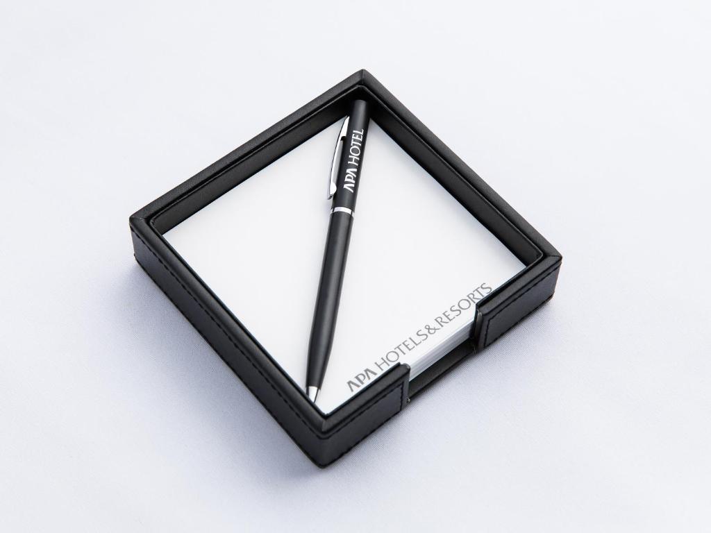 a black frame with a knife in it at APA Hotel Haneda Anamori Inari Ekimae in Tokyo