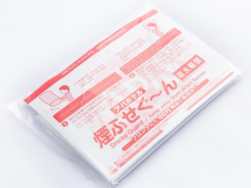 a plastic package with red and white text at APA Hotel Haneda Anamori Inari Ekimae in Tokyo