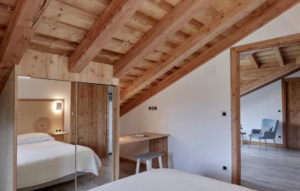 Postel nebo postele na pokoji v ubytování Apartamentos Ea Astei