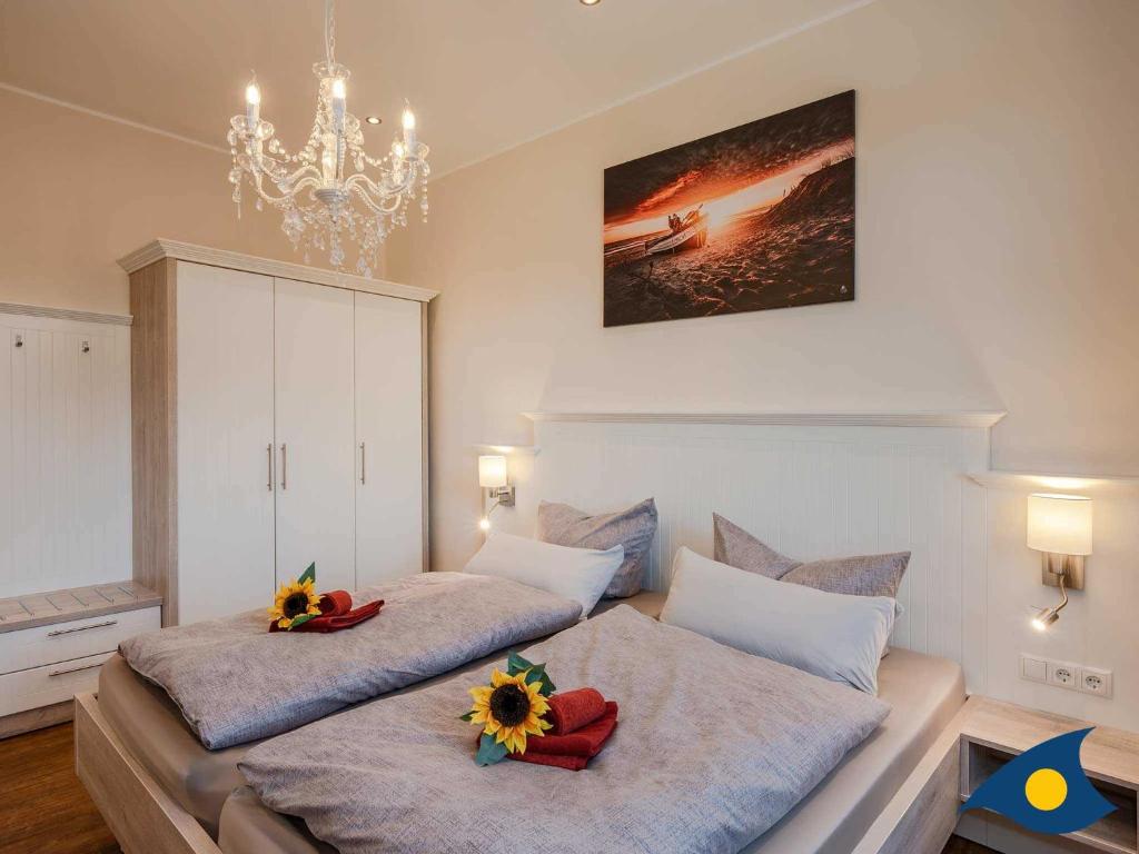 Postel nebo postele na pokoji v ubytování Villa Ute Whg Vanessa