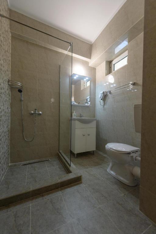 Koupelna v ubytování Hotel Cora