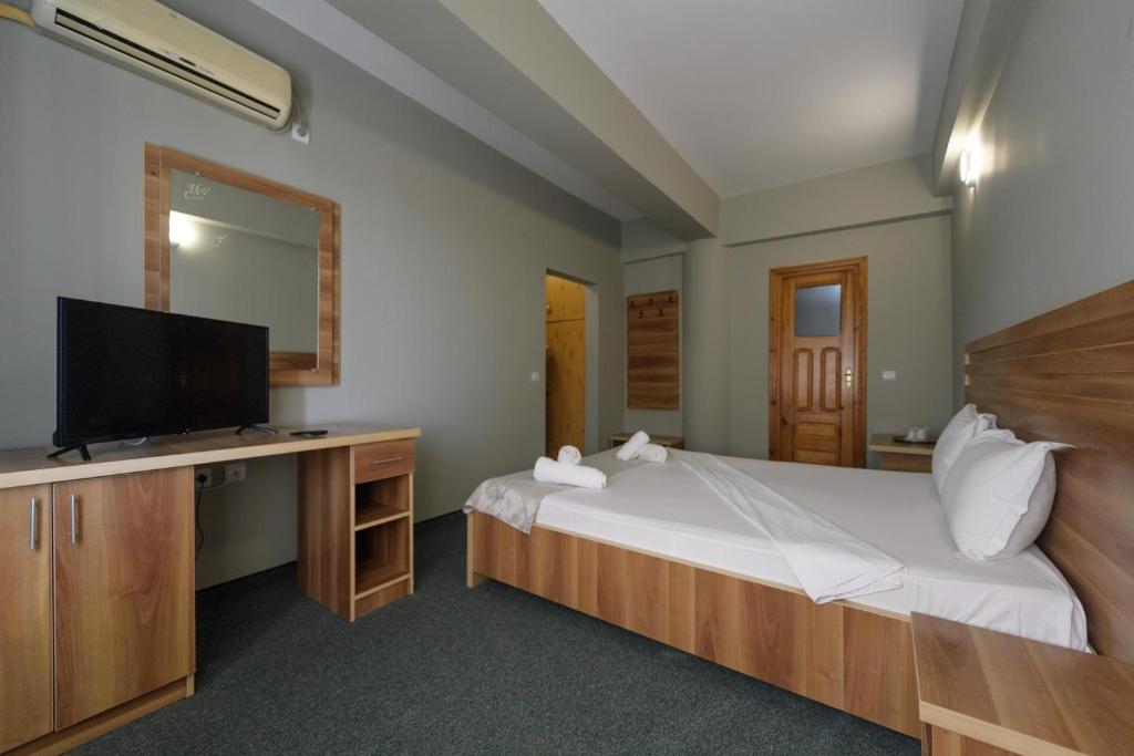 TV a/nebo společenská místnost v ubytování Hotel Cora