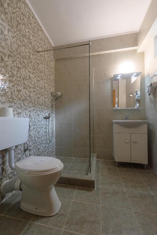 Koupelna v ubytování Hotel Cora