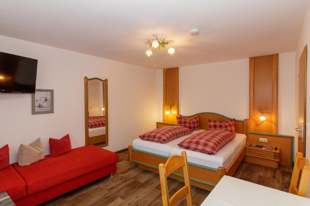 Postel nebo postele na pokoji v ubytování Hotel Binderhäusl