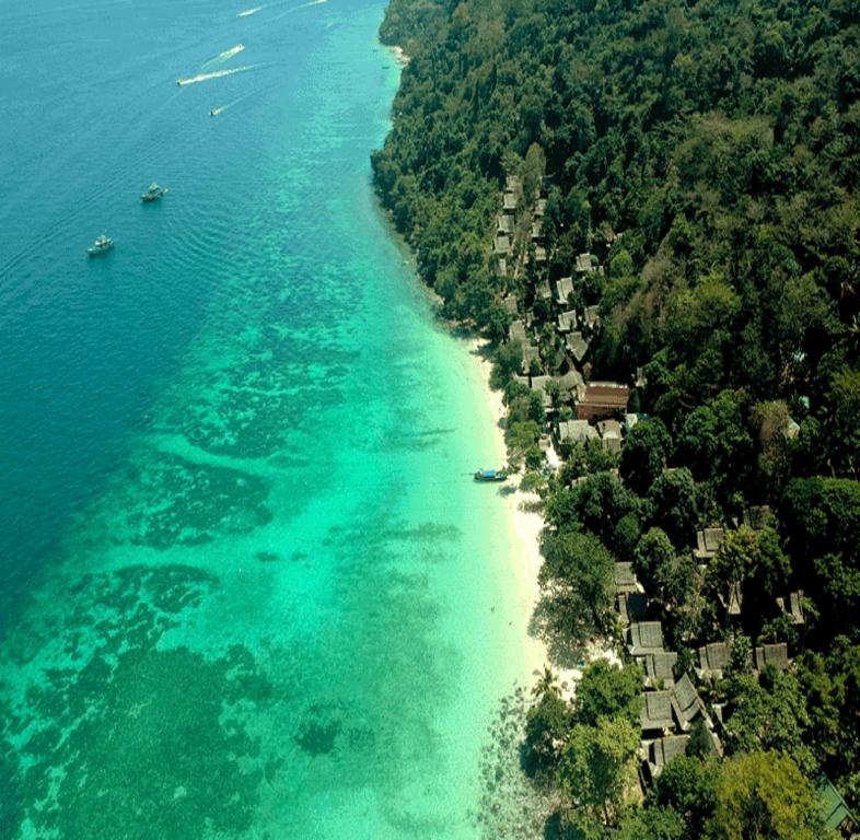 an aerial view of a beach and the ocean at Phi Phi Relax Beach Resort in Phi Phi Don
