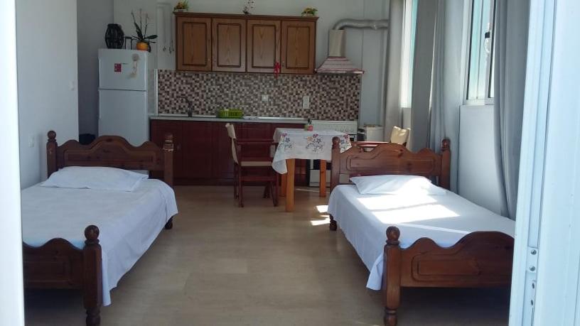 Postel nebo postele na pokoji v ubytování Margarita & Filippos Apartments Corfu