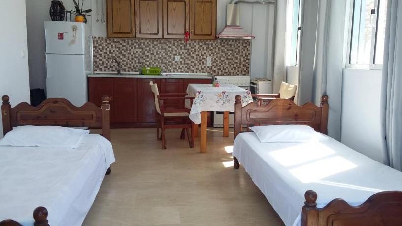Postel nebo postele na pokoji v ubytování Margarita & Filippos Apartments Corfu