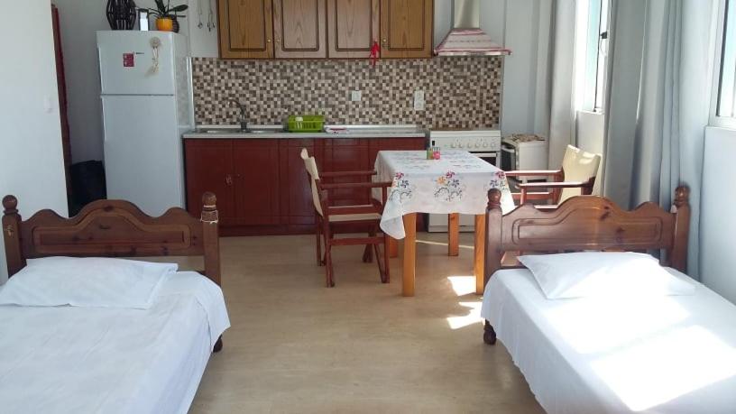 Postel nebo postele na pokoji v ubytování Margarita & Filippos Apartments Corfu