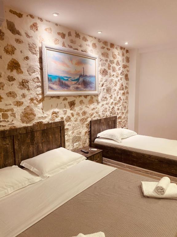 Cama o camas de una habitación en Alex Boutique Hotel