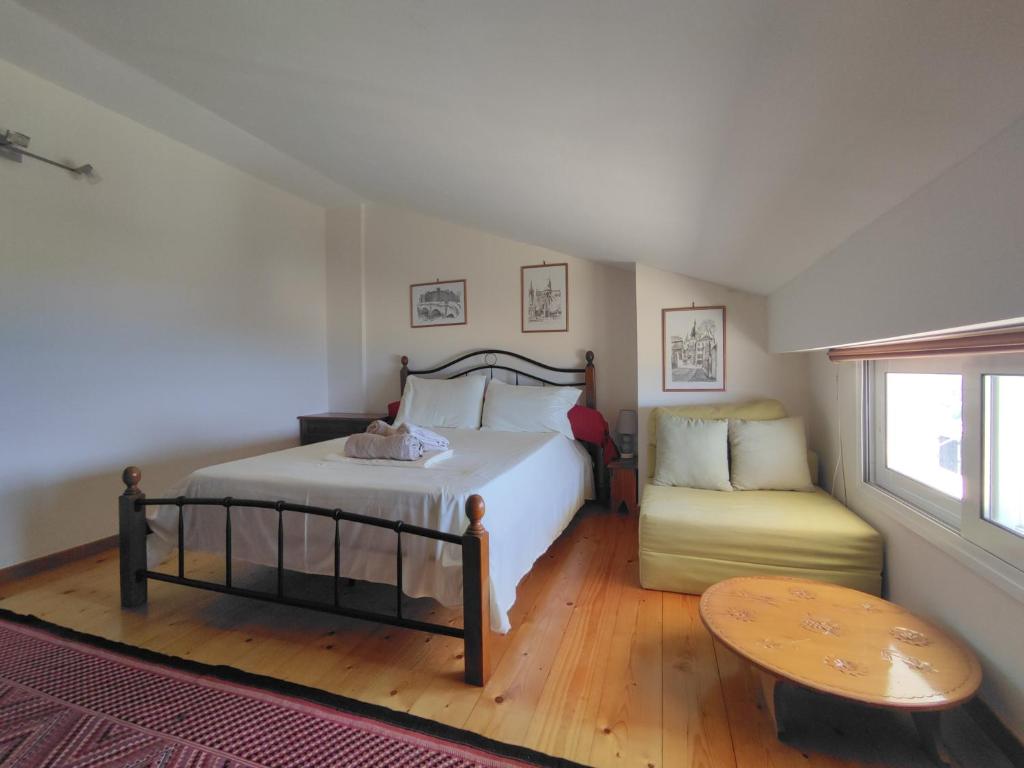 Ένα ή περισσότερα κρεβάτια σε δωμάτιο στο Seaside house