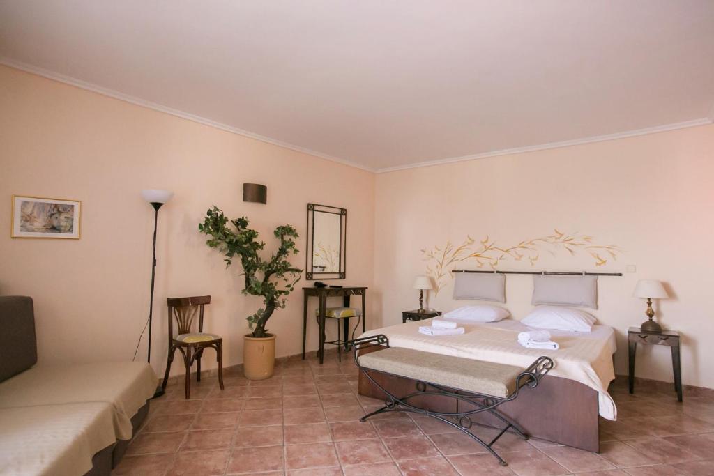 Posteľ alebo postele v izbe v ubytovaní Ammon Garden Hotel