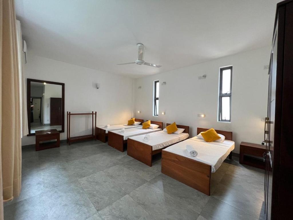 Postel nebo postele na pokoji v ubytování VIBE Hostels