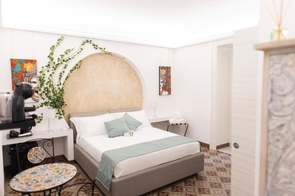 Postel nebo postele na pokoji v ubytování B&B i MORI