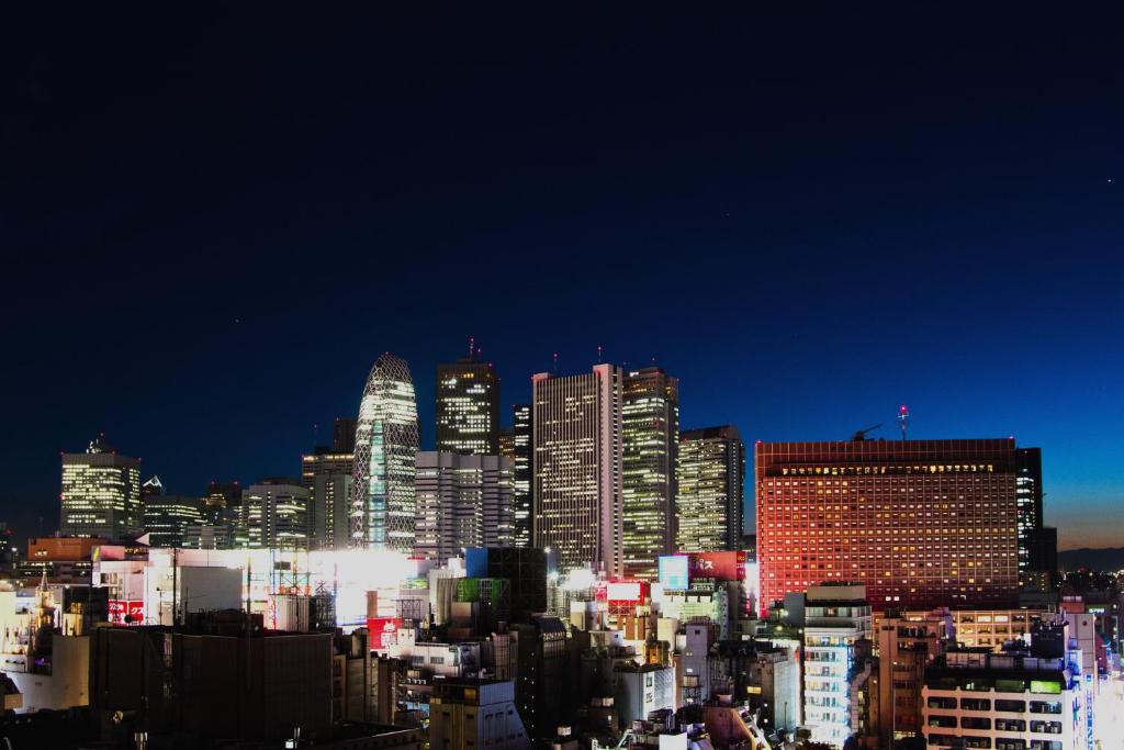 a view of a city skyline at night at Citadines Central Shinjuku Tokyo in Tokyo