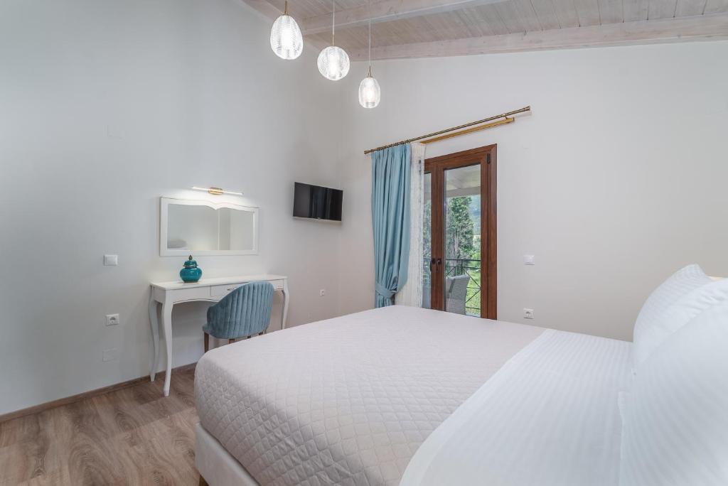 Posteľ alebo postele v izbe v ubytovaní Vincenzo Suites
