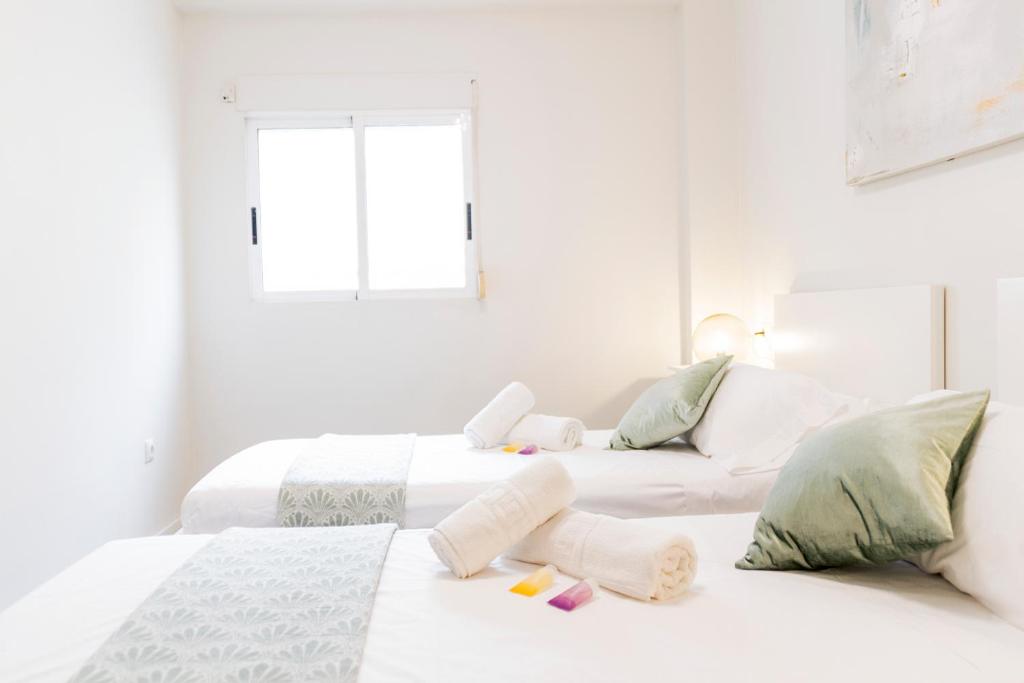 Postel nebo postele na pokoji v ubytování Cabanyal Luxury Malvarrosa Beach