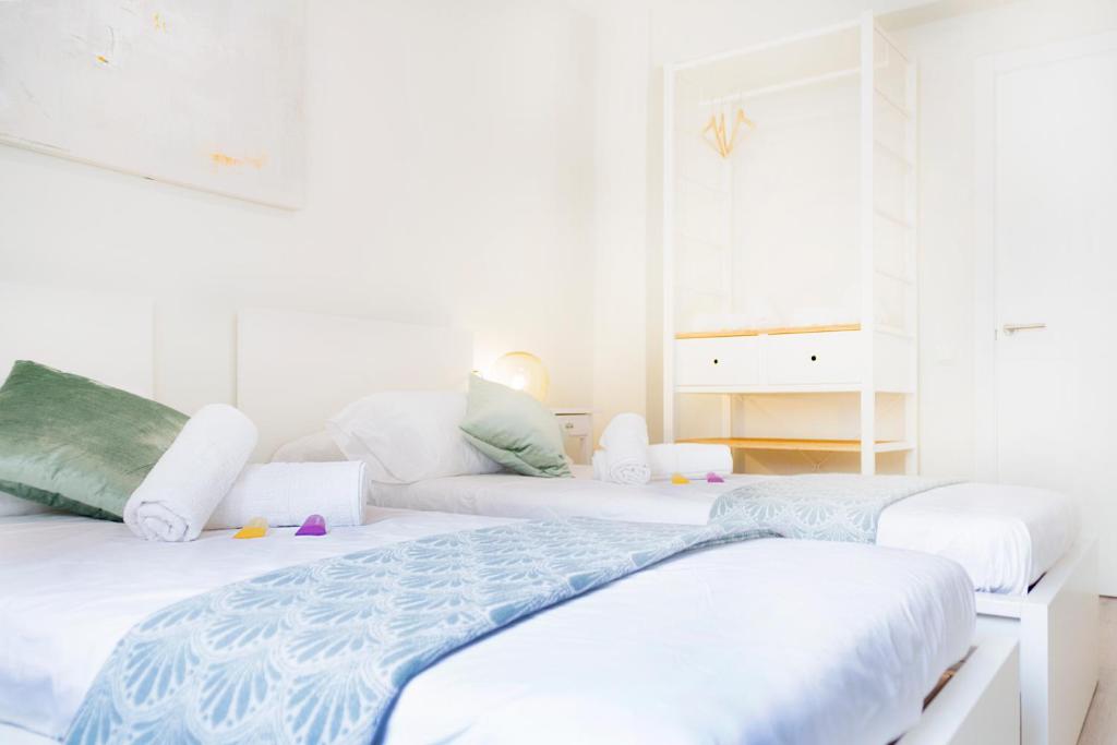 Postel nebo postele na pokoji v ubytování Cabanyal Luxury Malvarrosa Beach