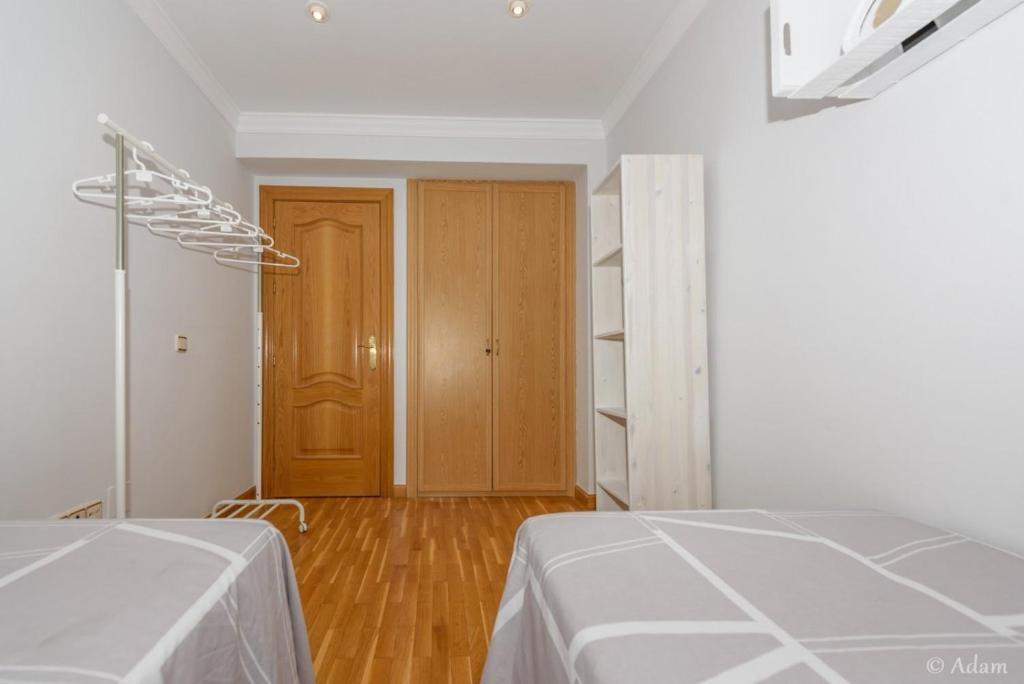 Posteľ alebo postele v izbe v ubytovaní Precioso apartamento en Málaga al lado de la playa