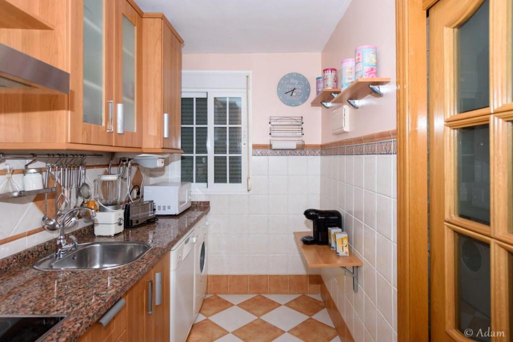 Kuchyňa alebo kuchynka v ubytovaní Precioso apartamento en Málaga al lado de la playa