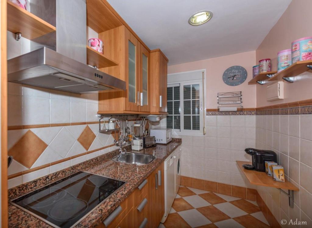 Kuchyňa alebo kuchynka v ubytovaní Precioso apartamento en Málaga al lado de la playa