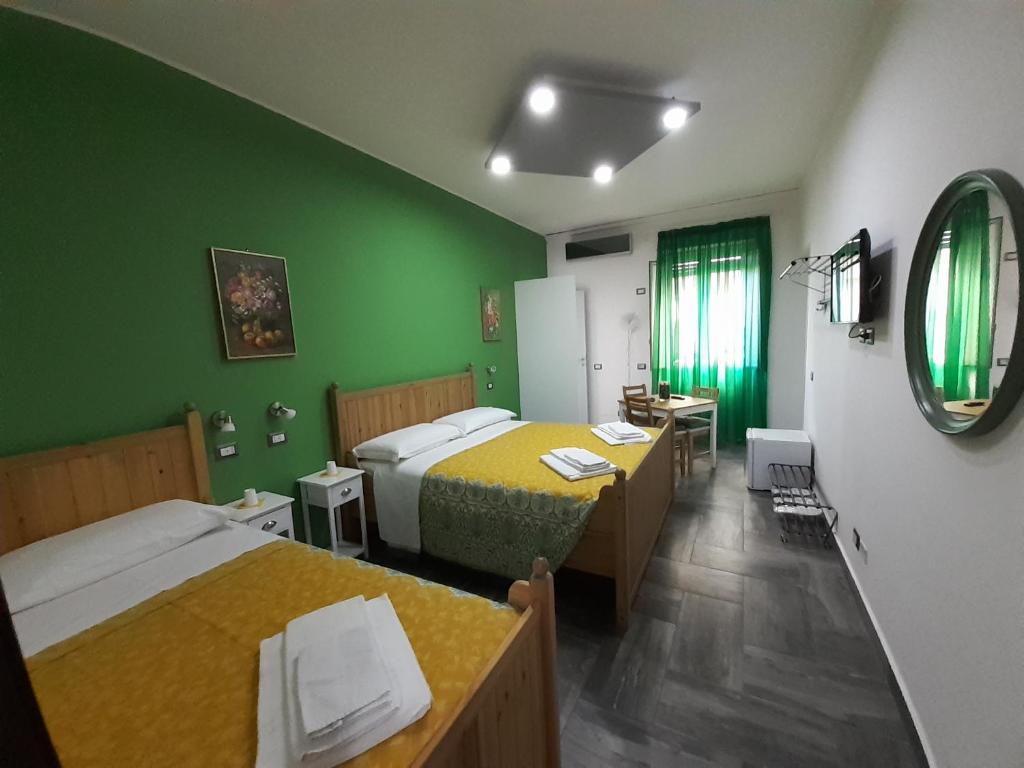 Postel nebo postele na pokoji v ubytování Casa Provenza