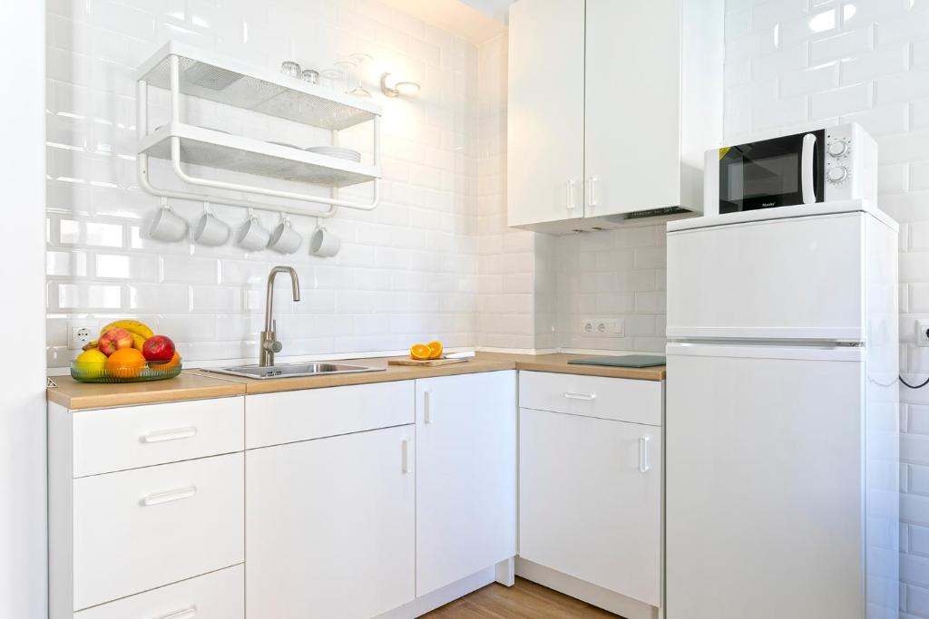 Kuchyňa alebo kuchynka v ubytovaní Malaga Center Lagunillas Apartments
