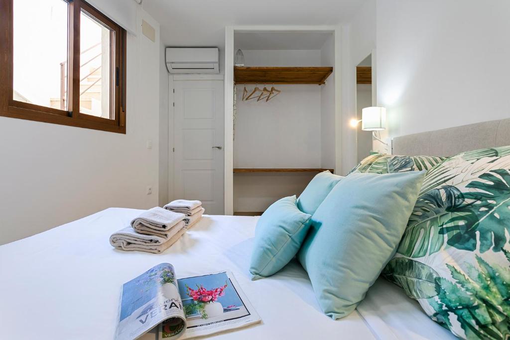 Posteľ alebo postele v izbe v ubytovaní Malaga Center Lagunillas Apartments