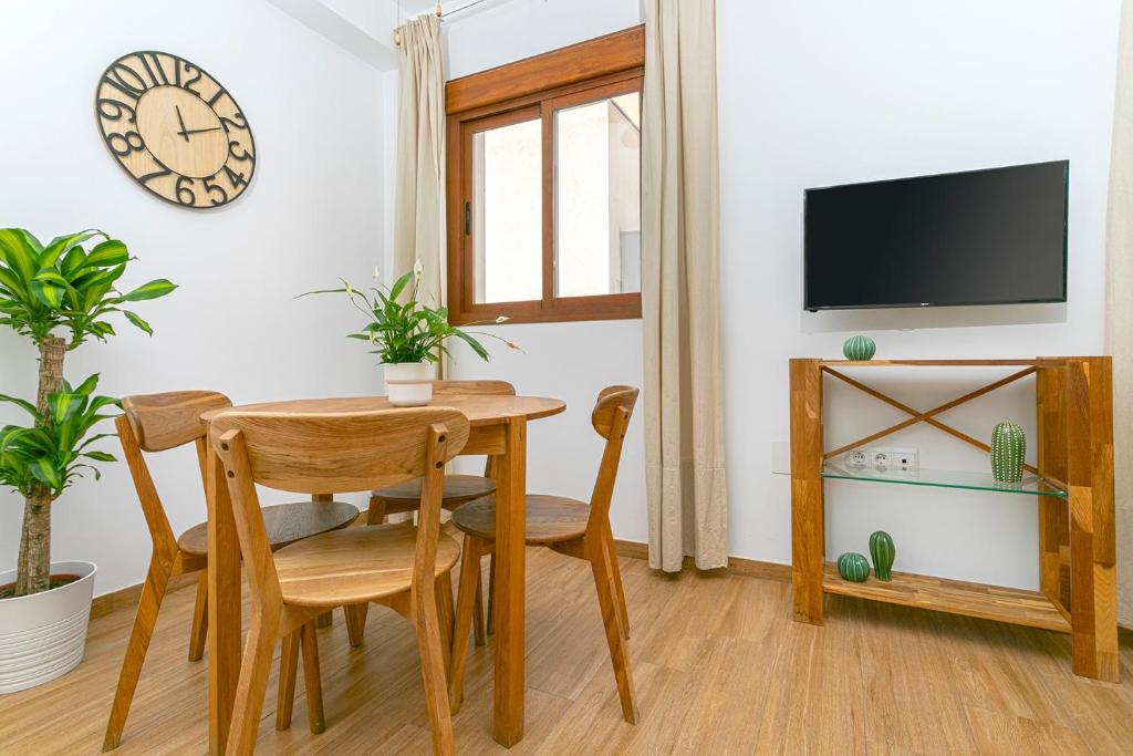 Televízia a/alebo spoločenská miestnosť v ubytovaní Malaga Center Lagunillas Apartments