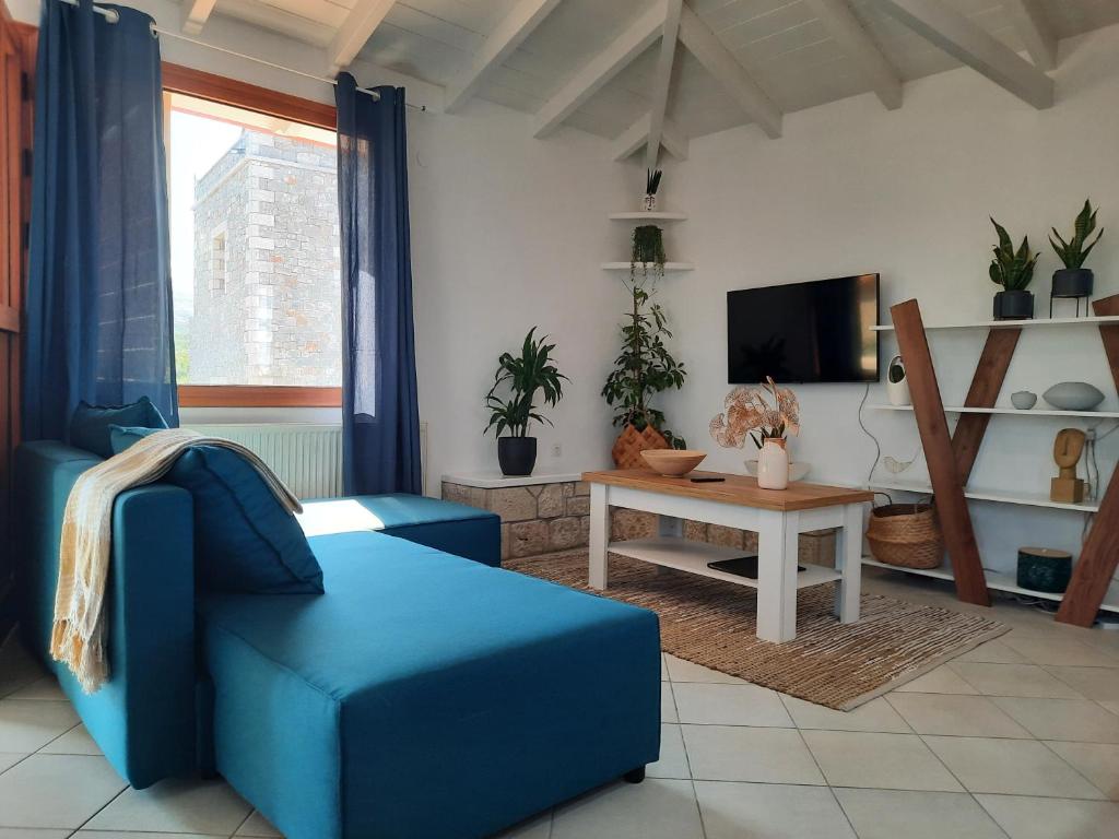 A television and/or entertainment centre at Athina Apartments