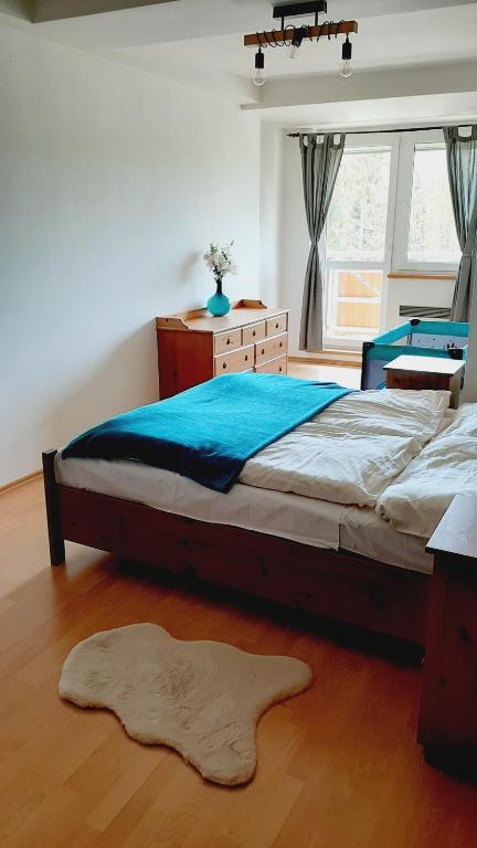Postel nebo postele na pokoji v ubytování Apartmánový dom Tatran, Apartmán A32