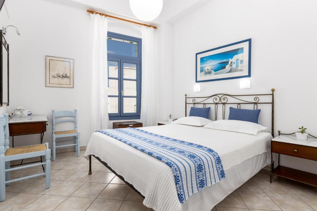 Postel nebo postele na pokoji v ubytování Hotel Dina