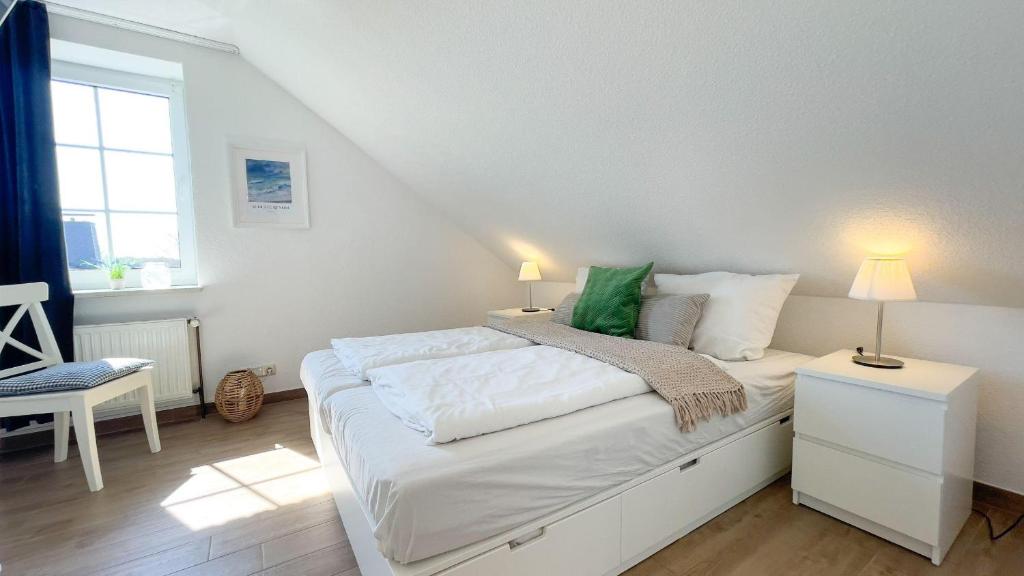 Ένα ή περισσότερα κρεβάτια σε δωμάτιο στο Haus-Kirsten-Fewo-Nr-6